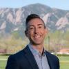 Wil Srubar with the mountains blurred in the background.