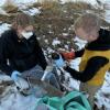 Julie Korak and Cresten Mansfeldt sample water collect surface water samples on the Coal Creek waterway.
