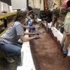 Shaping the canoe mold.