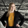 Kellisha Ostler standing on a bridge.
