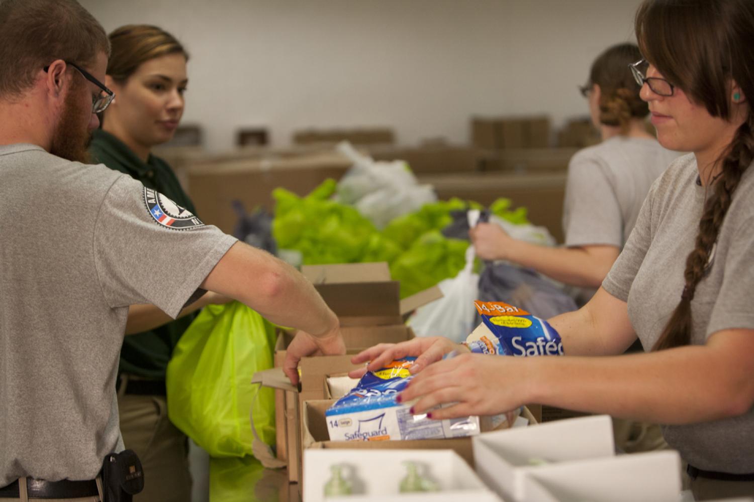 People getting food at a food bank.