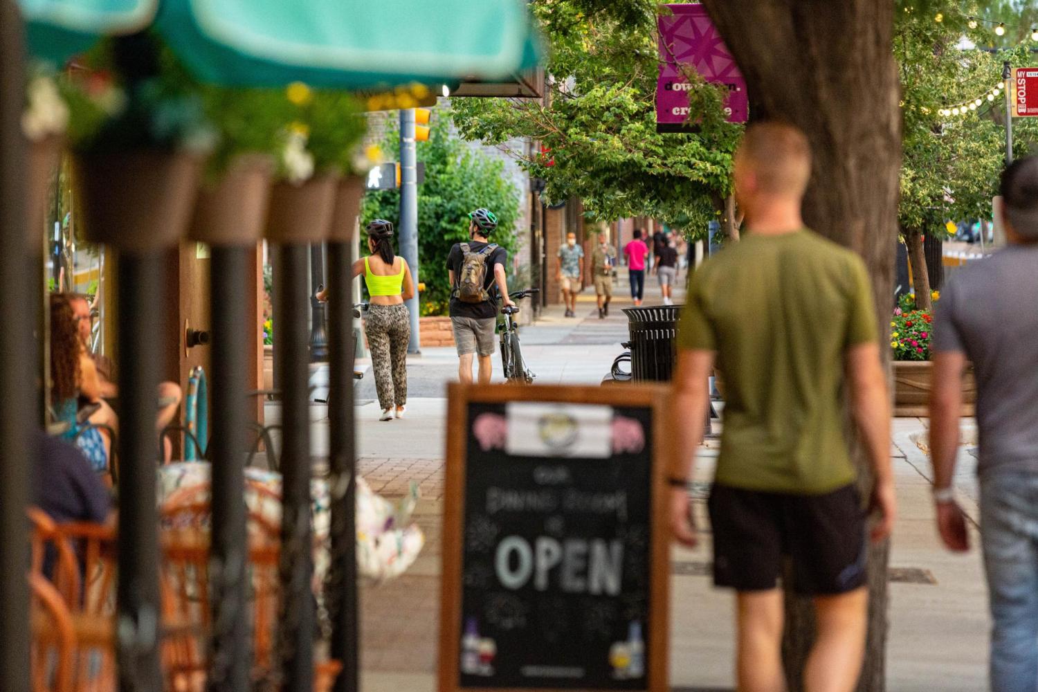 People walking on 500 block of Main Street in Longmont