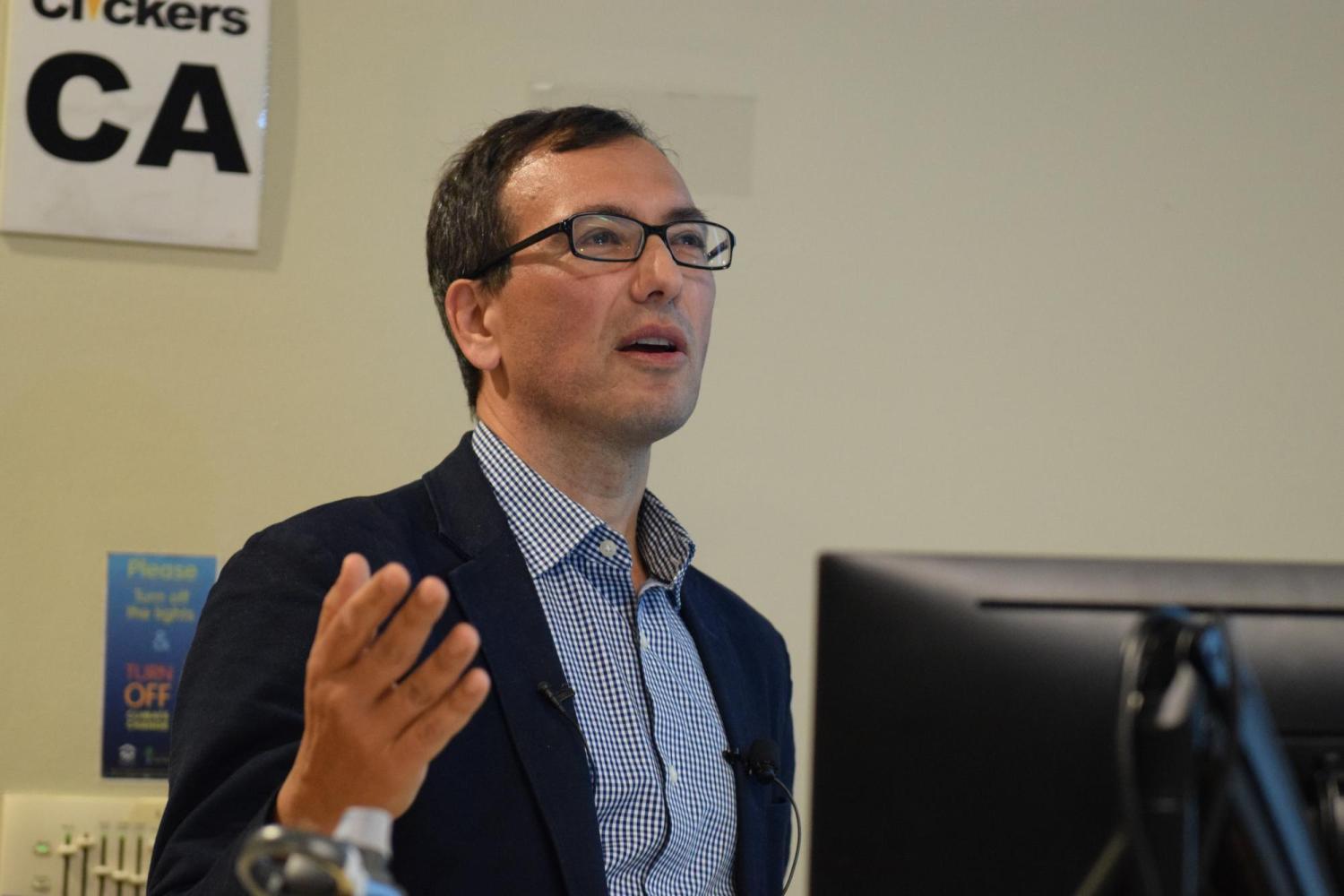 Eric Lipton speaking at the CEJ Ackland Lecture in Journalism. (Photo by: Shannon Mullane)