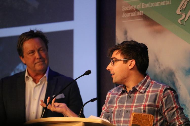 Chris McCrory accepts the Ray Reece "Excellence in Environmental Journalism" Student Award. Photo by Kelsey Simpkins