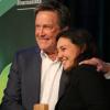 Jeff Burnside embraces Lindsey Fendt as she accepts the award for Outstanding Investigative Reporting, Small Market. Photo by Kelsey Simpkins