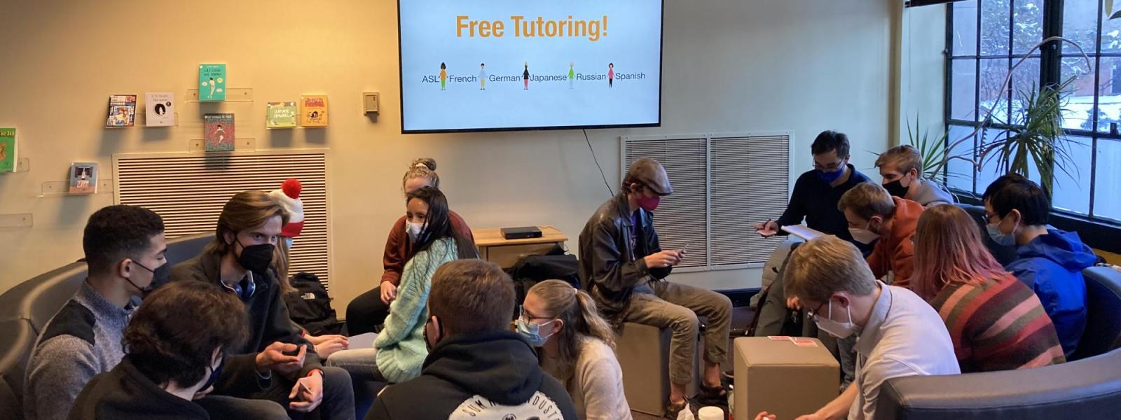 Photo of German students conversing in groups