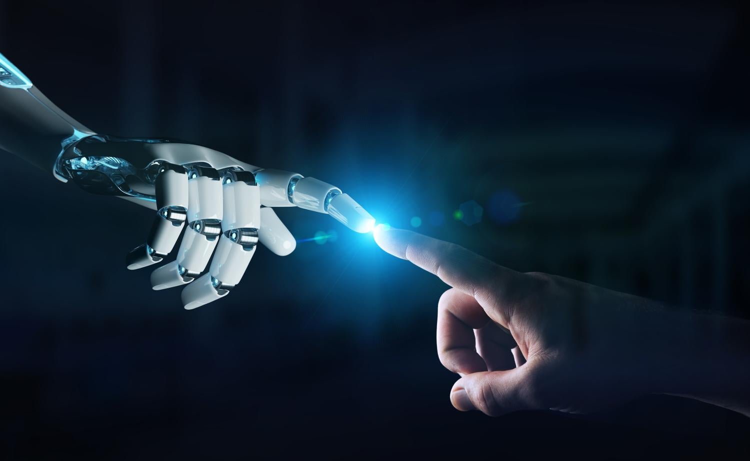 robot finger touching human finger