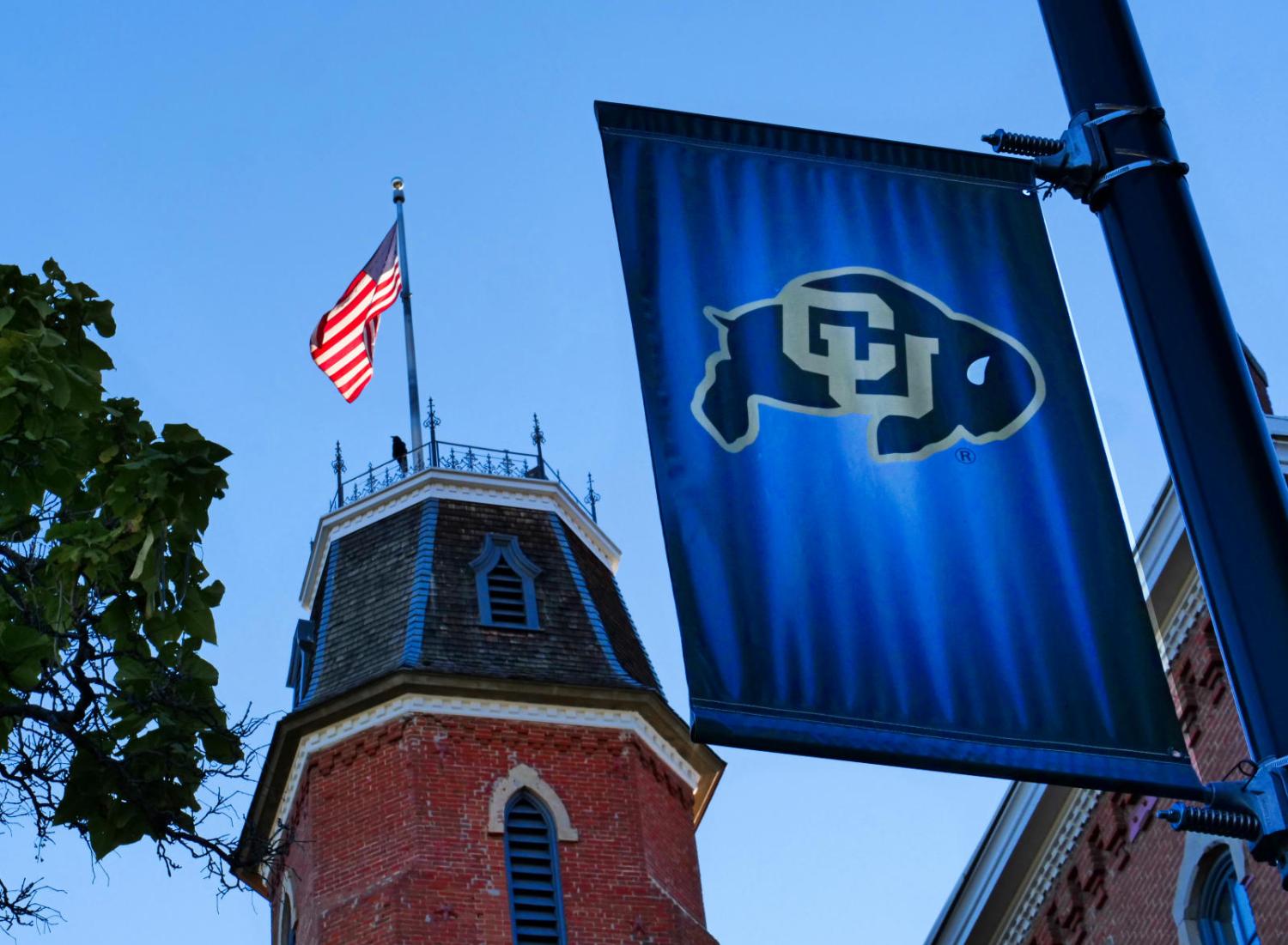 old main and CU flag