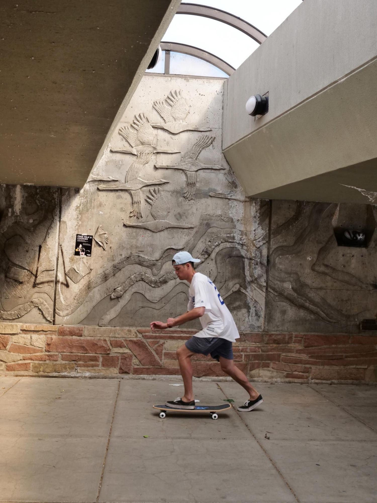 skateboarder on the hill