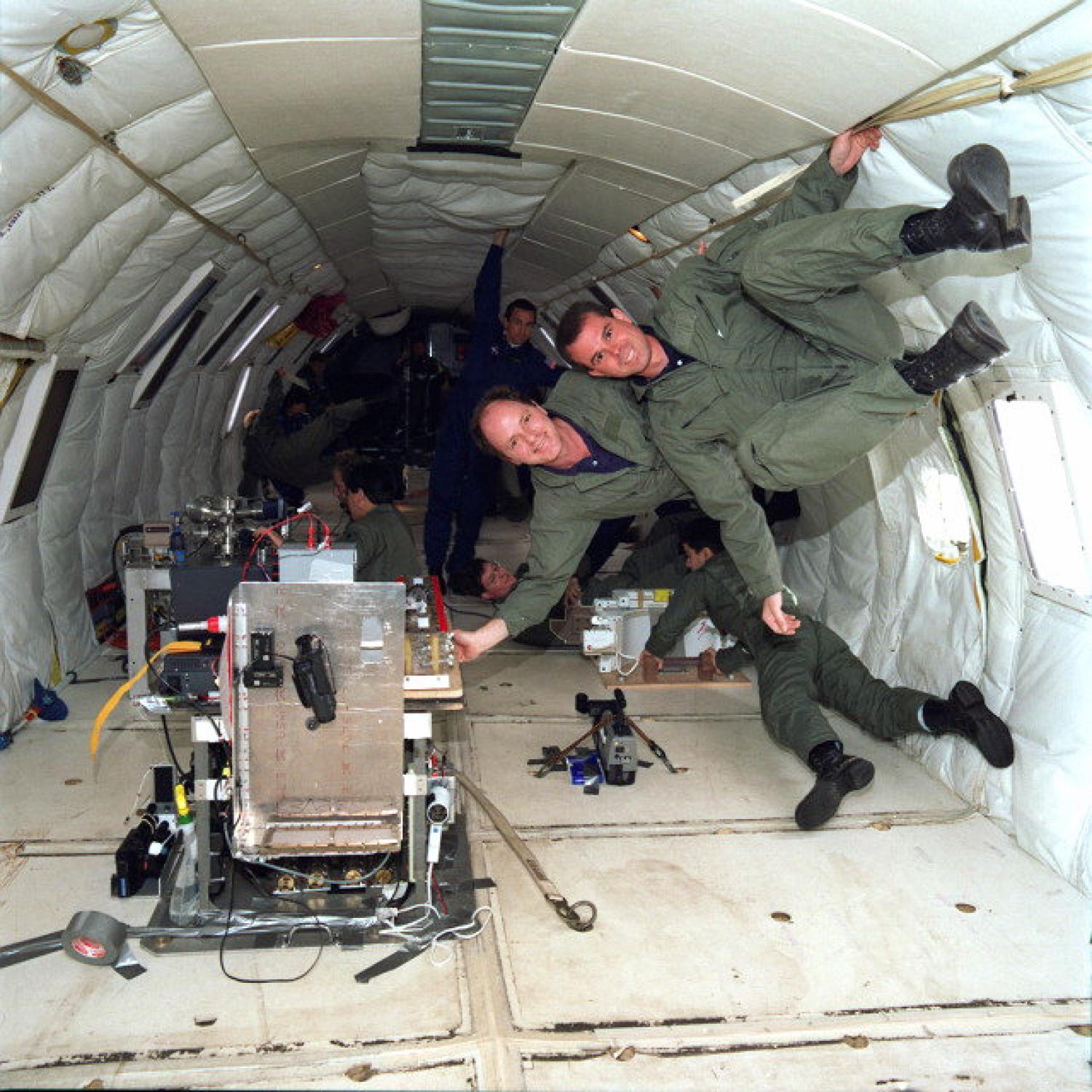 BioServe personnel on a microgravity flight testing hardware