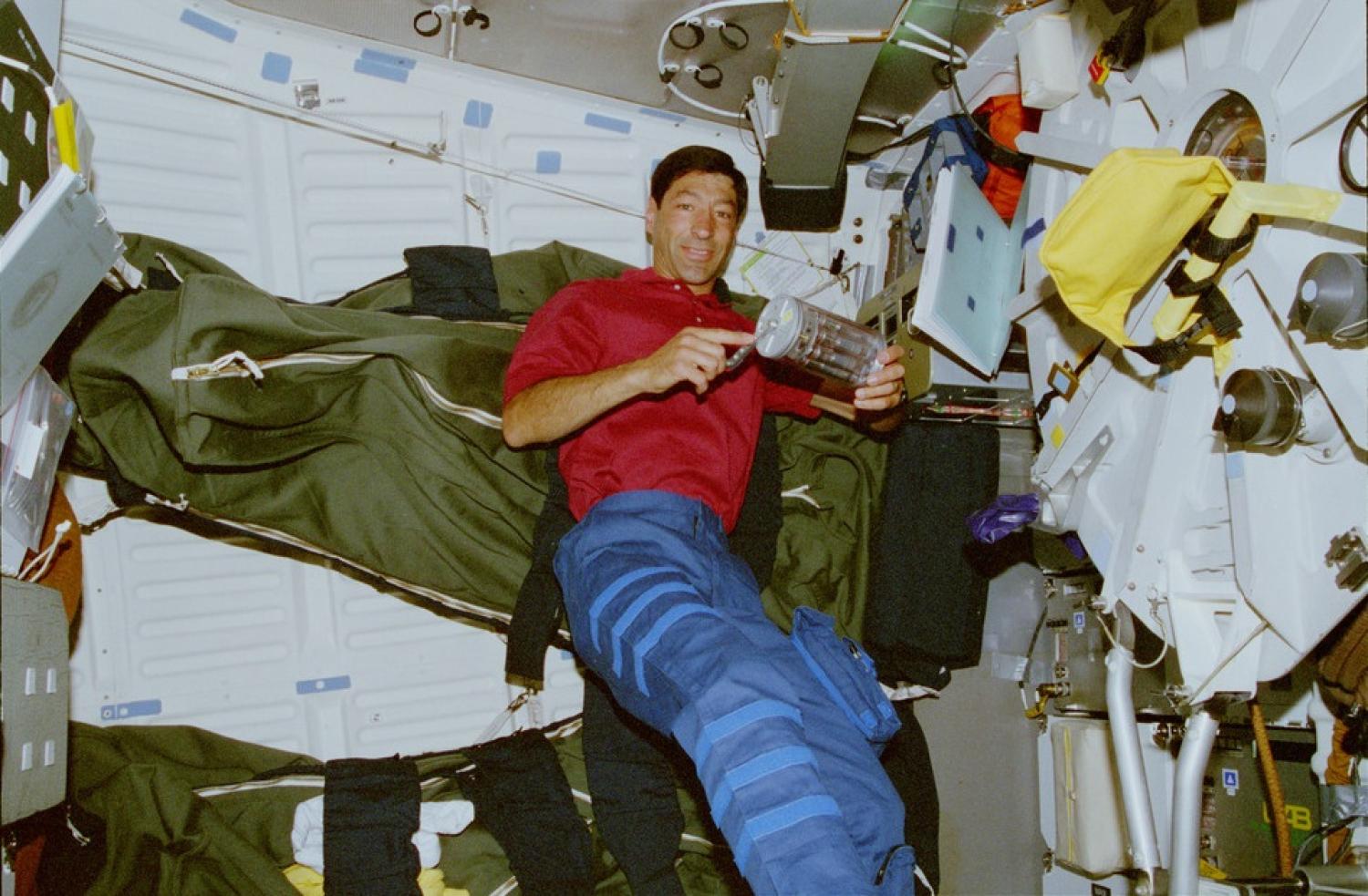 NASA astronaut Marco Runco activating a GAP on STS-77 during the IMMUNE-03 experiment