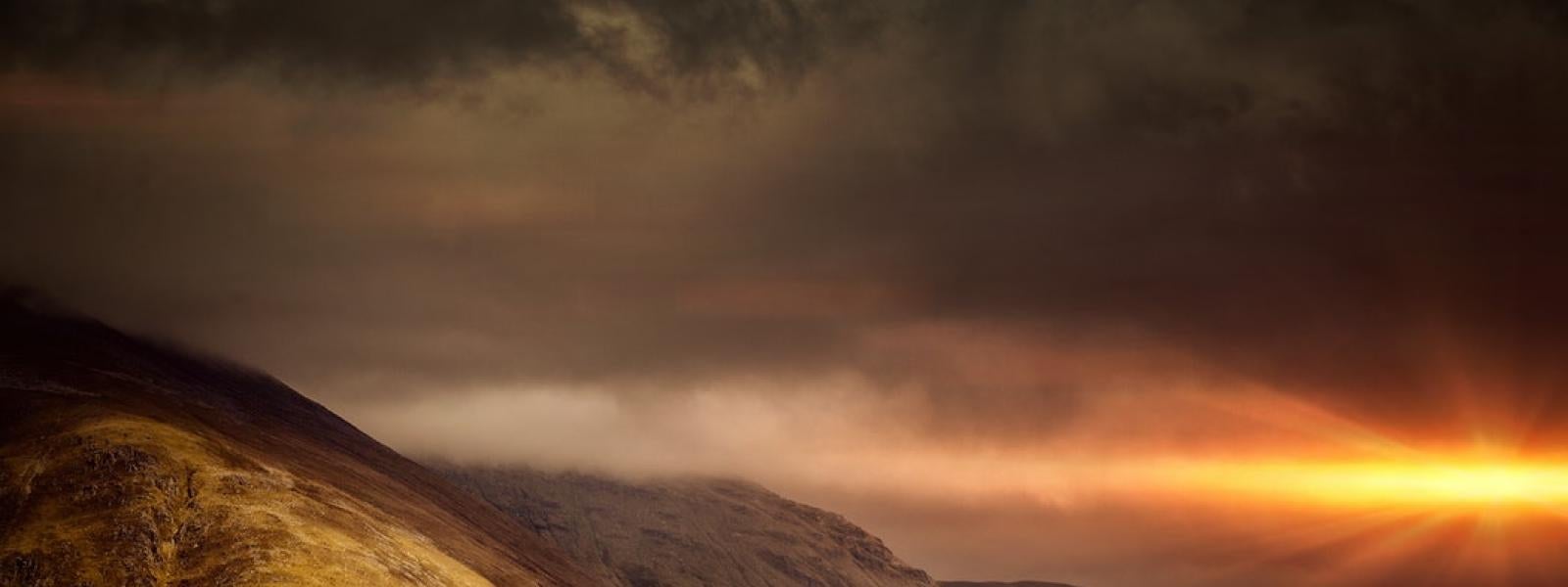 Countryside in Scotland at sunset.