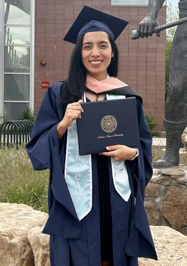 Cande in Graduation Gown