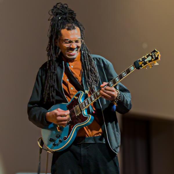 musician playing guitar