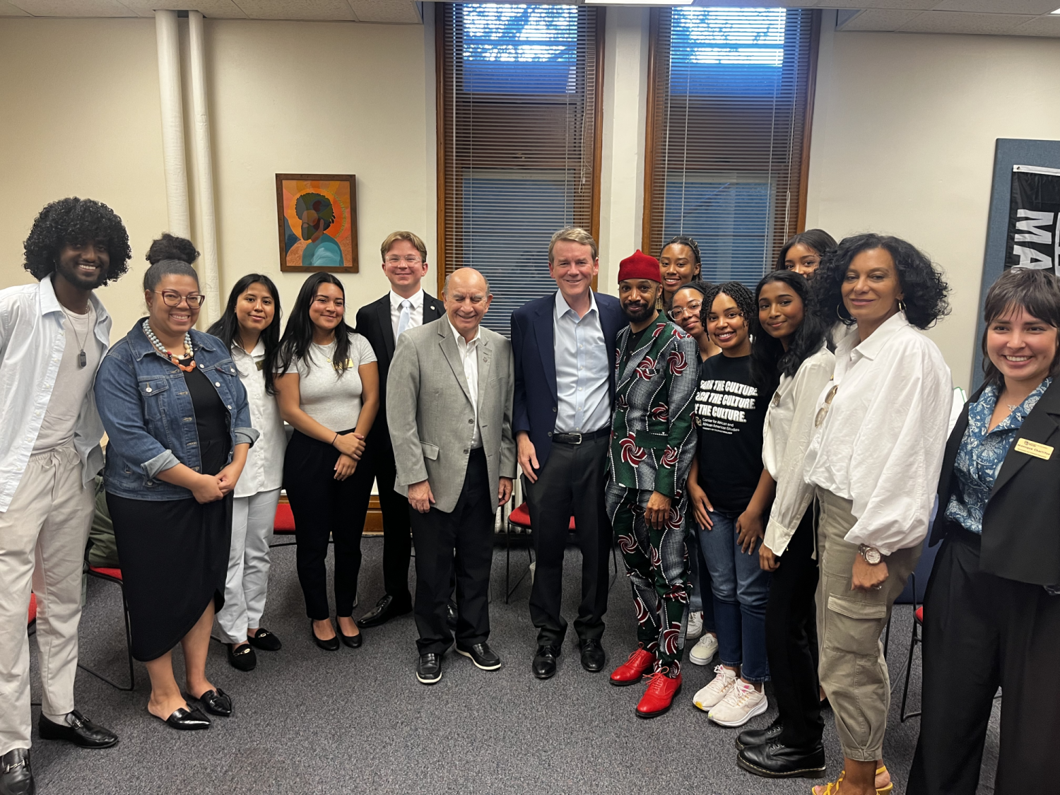 Photo of Senator Bennet and the CAAAS Community