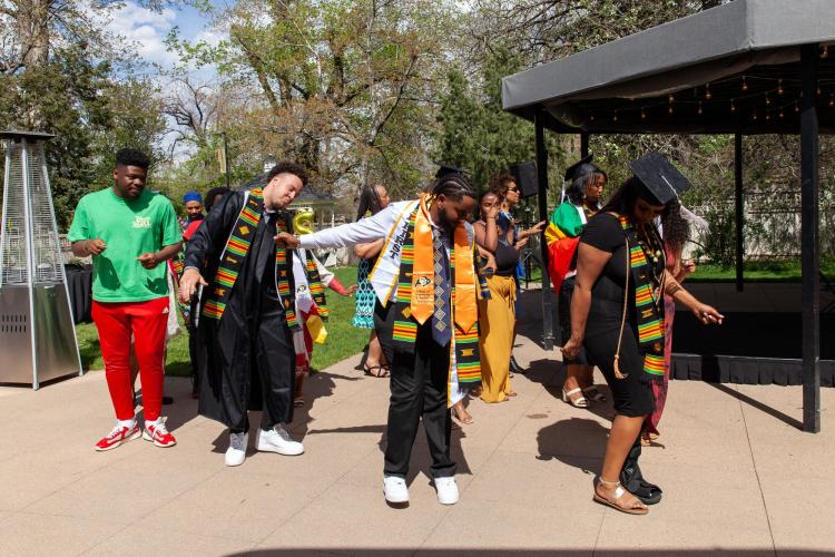Image of Graduates dancing