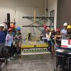 EERI Students Standing by Shake Table
