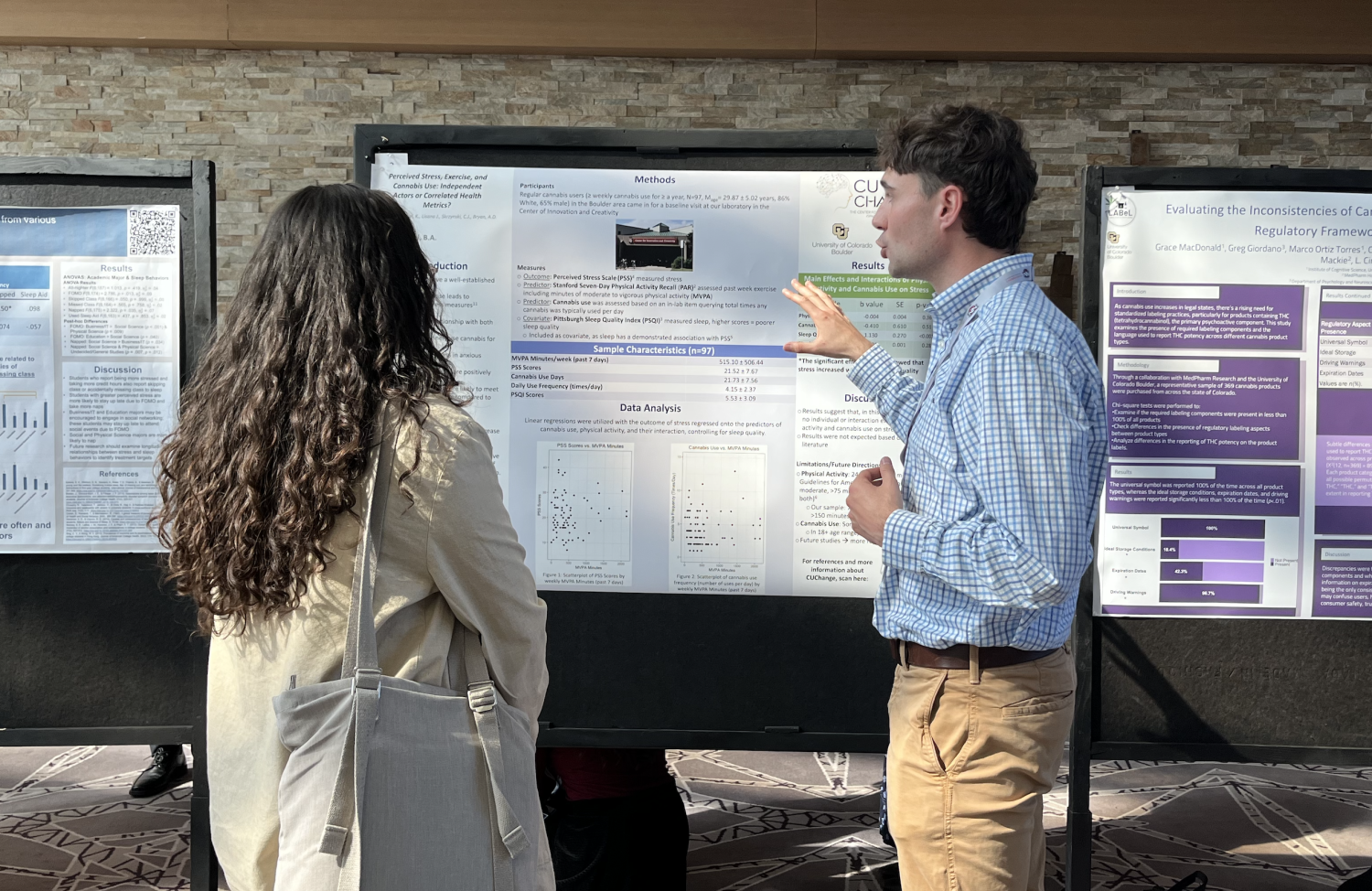 Kyle Chrystal presenting poster