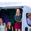 mobile lab with research team members standing inside