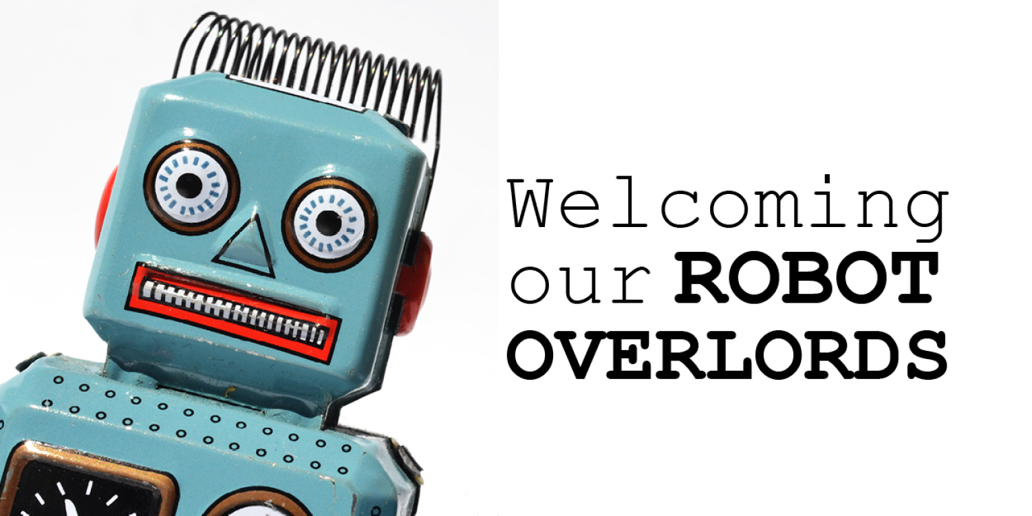 A vintage robot toy with text reading "Welcoming our robot overlords"
