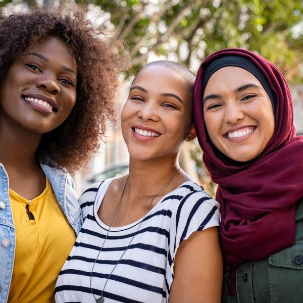 Multiethnic young friends enjoying together