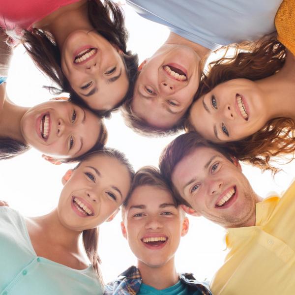 Group of smiling teenagers