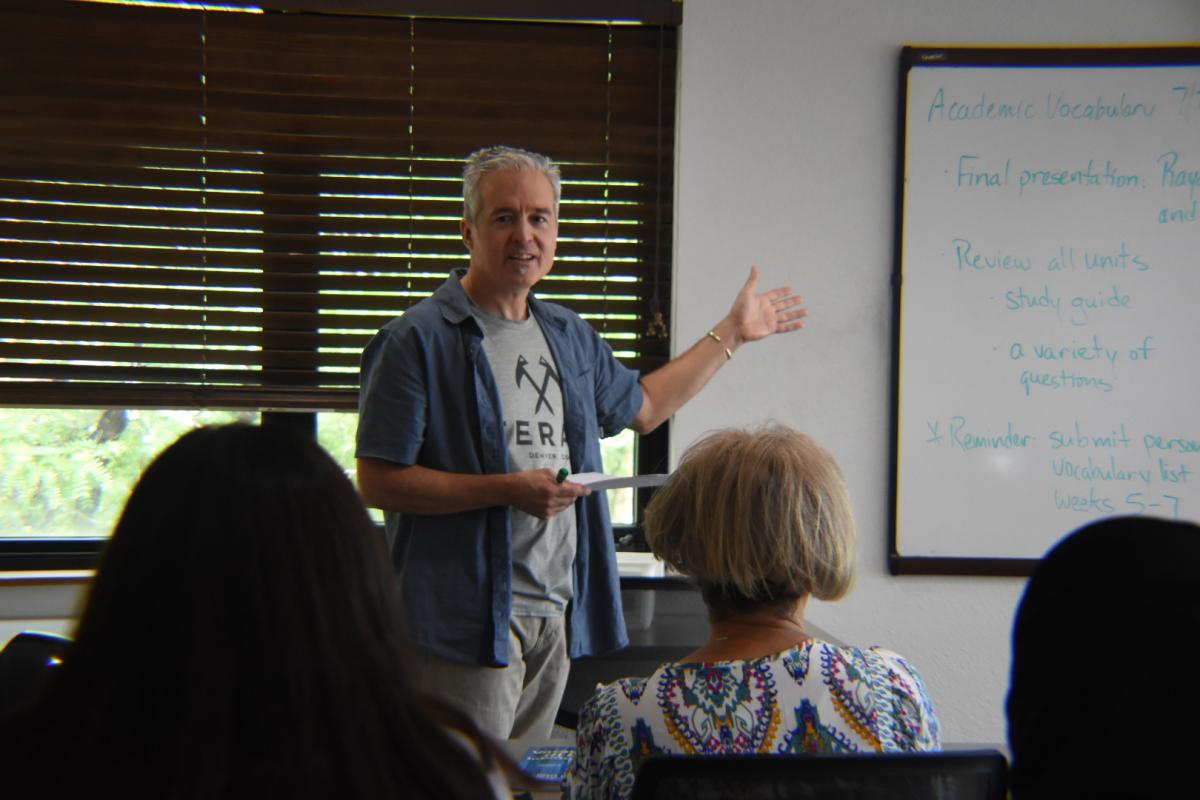 Tom providing explanation to students