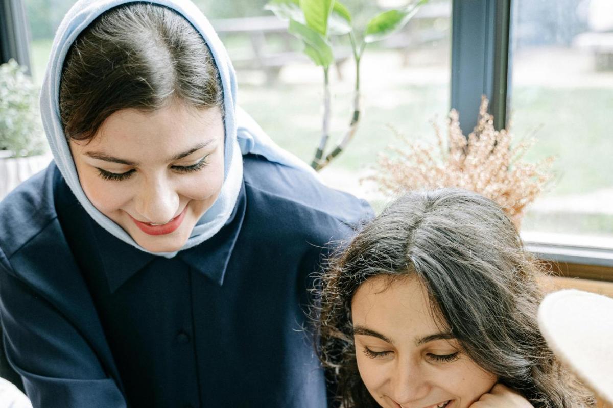 Woman guiding student