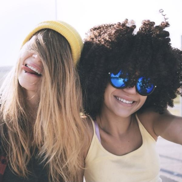 two girls laughing