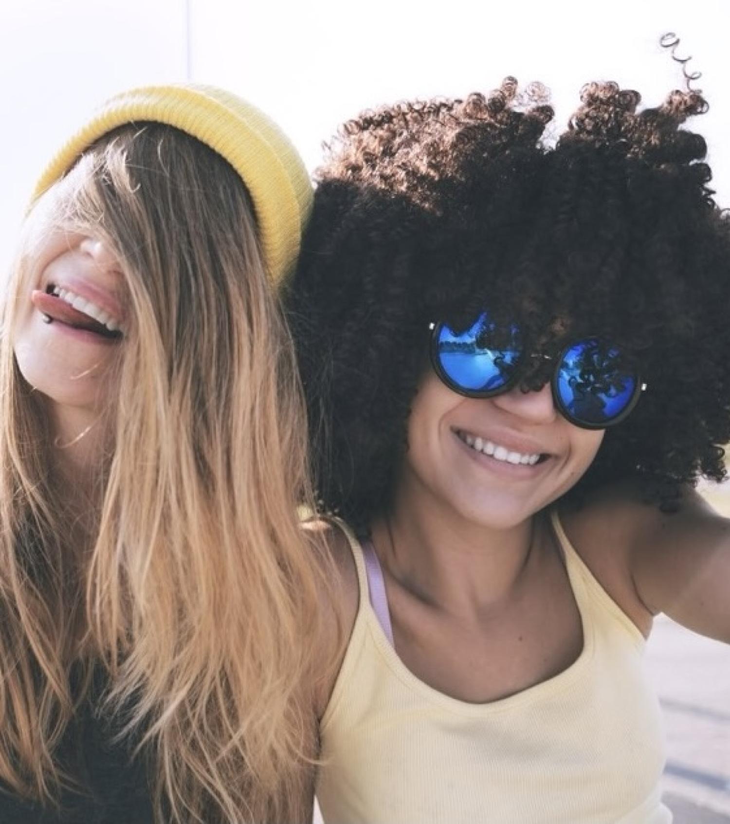 two girls smiling