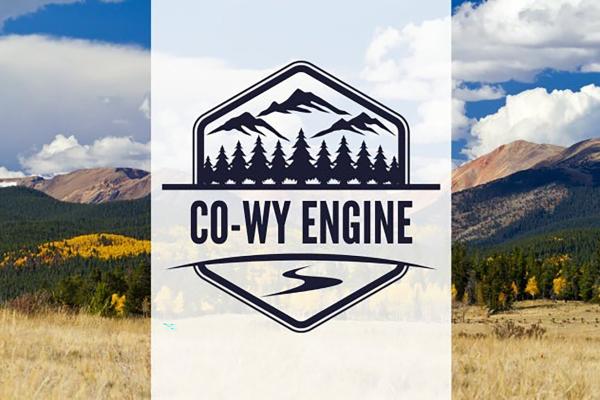 Colorado-Wyoming Engine Logo with mountains in the background