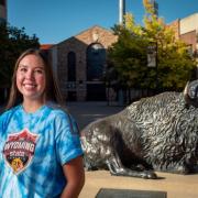 Jenna Whiteplume outside Folsom field