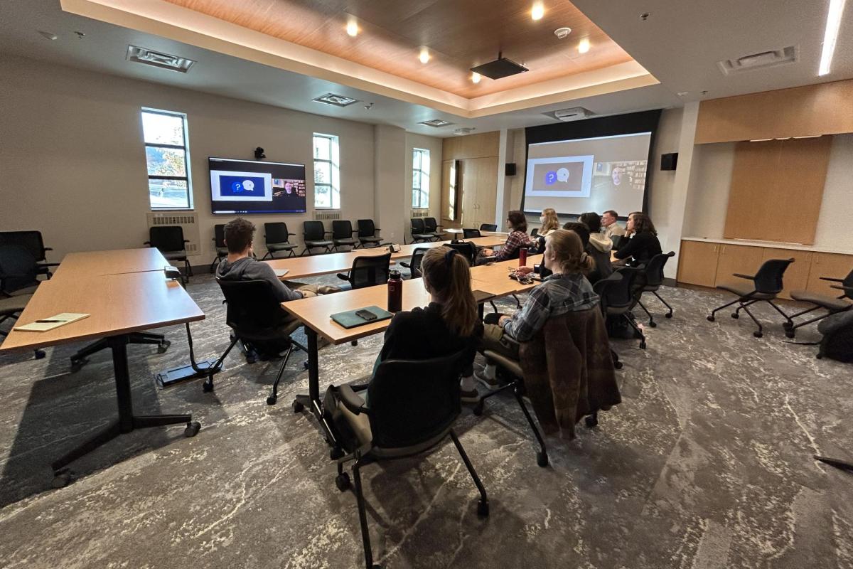 Students in a classroom for a guest speaker event