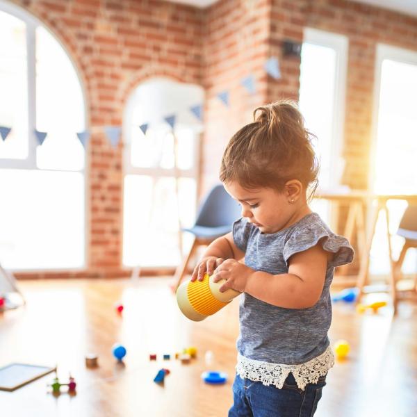 child playing with toy