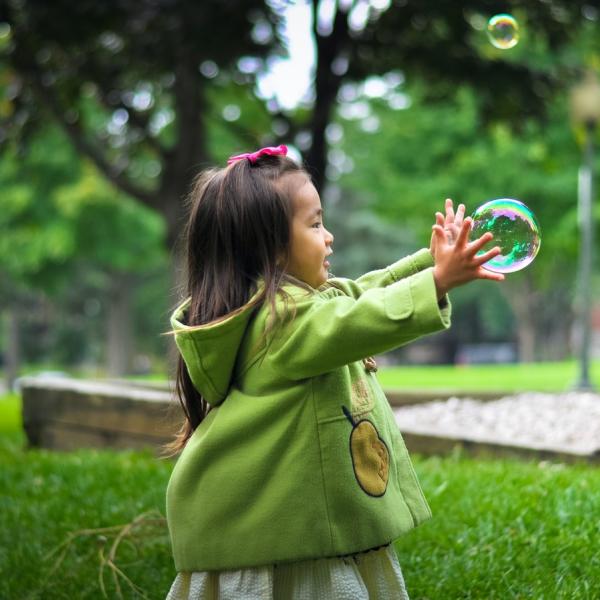 young girl with a big bubble