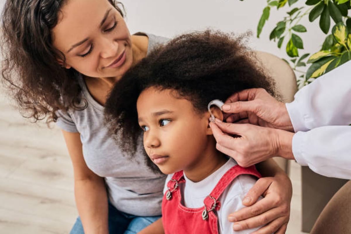 child with hearing aid