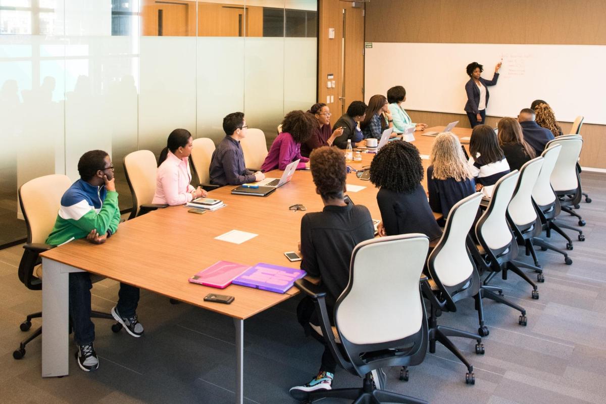 Woman giving a presentation to a group
