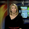 TV news still reported with "a greener path to recovery" on screen behind her
