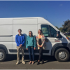 Cinnamon Bidwell Leigha Larsen and Parker Gross with the mobile lab