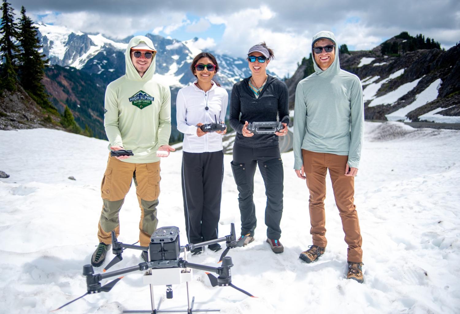 ICE team posed with drone and core