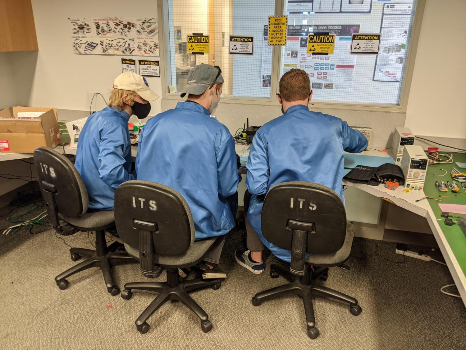 STEAM mechanical team working on avionics prototype