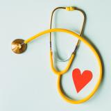 yellow stethoscope with a heart in it