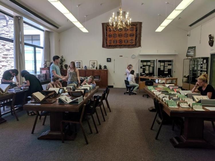 Students pore over special collections materials