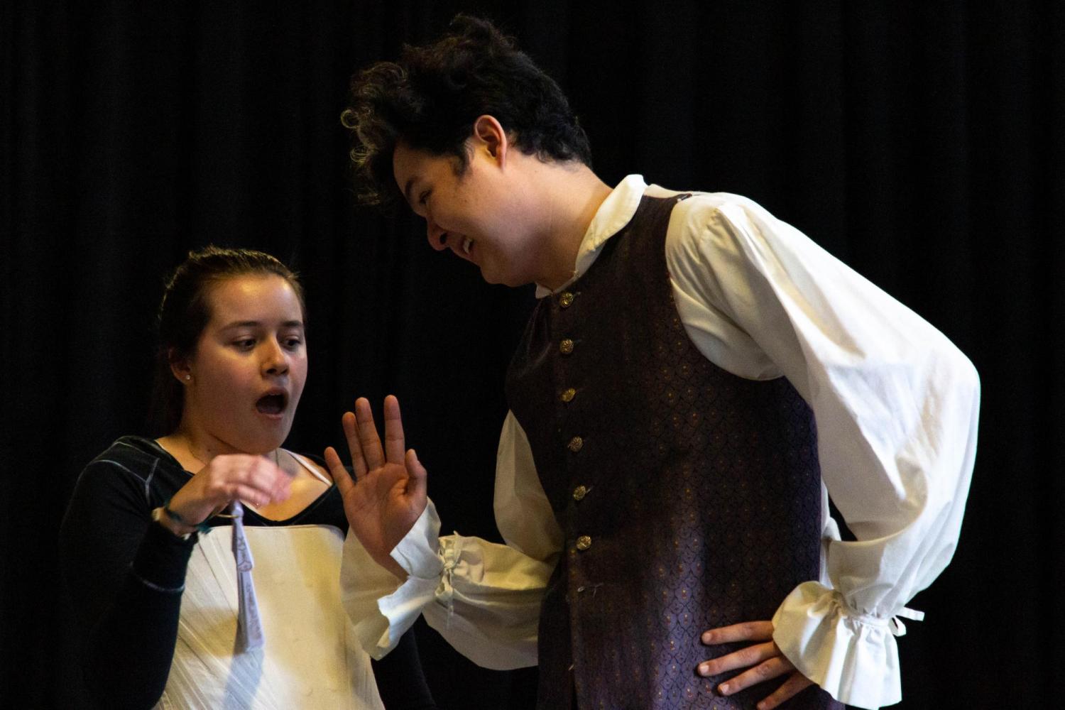 Two actors on stage