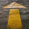 yellow arrow pointing the way