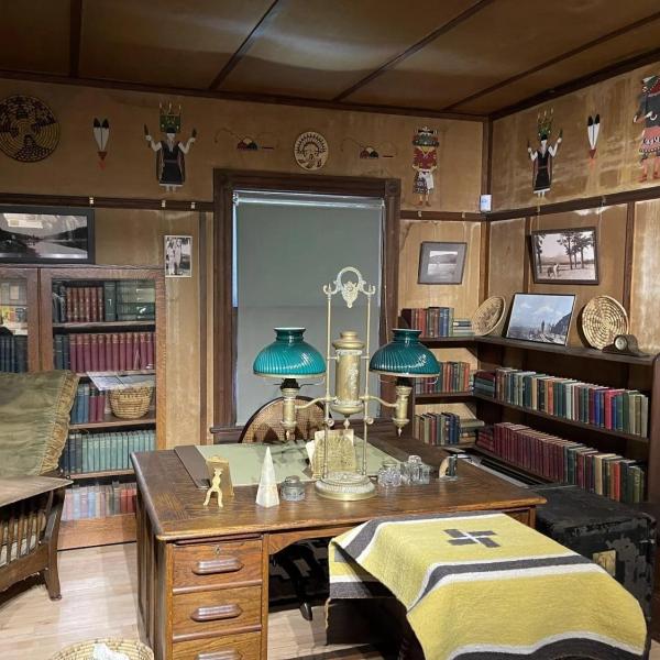 Zane Grey's office in Pennsylvania home, note the chair where he wrote prolifically and the frieze paintings above
