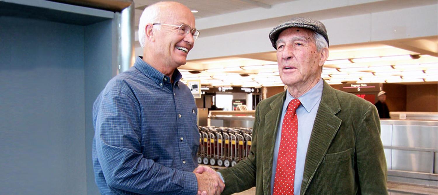 James Watt shaking hands with Stewart Udall