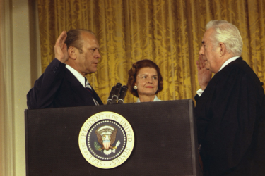 Photograph of Chief Justice Warren Burger administering the Oath of Office to President Gerald R. Ford while Betty Ford looks on. Photo courtesy of Wikipedia, by Robert Leroy Knudsen