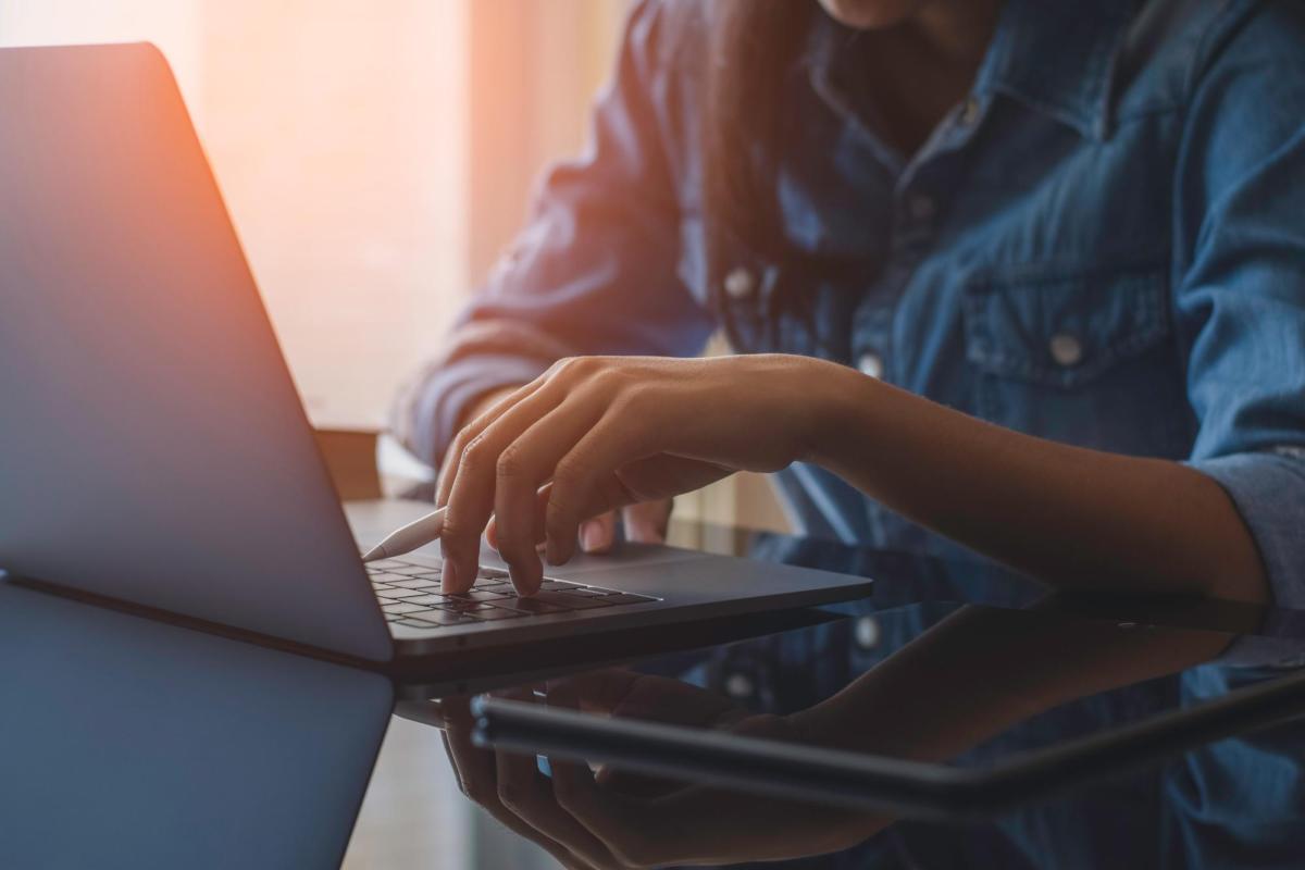 Student working on professional school application on computer