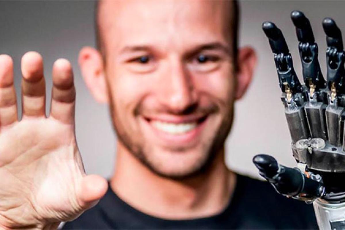 University of Colorado Biomedical Engineering image of man with robotic hand